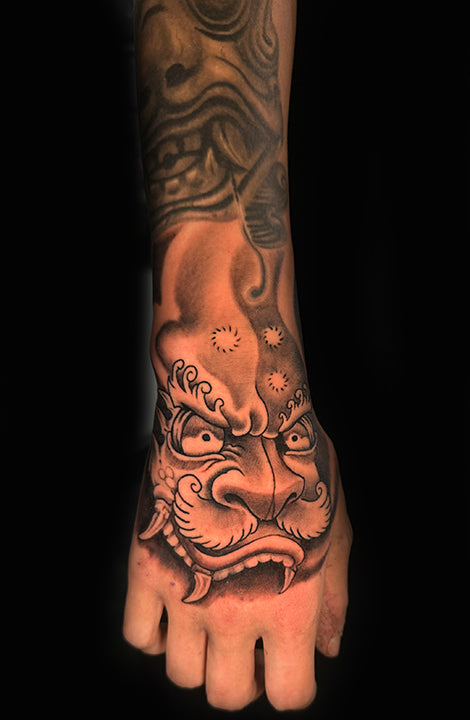Script and ornamental tattoo